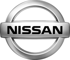 Nissan logo. Silver circle with "NISSAN" in black text across the centre.