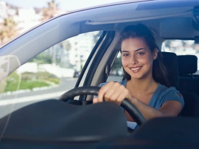 Woman driving to work
