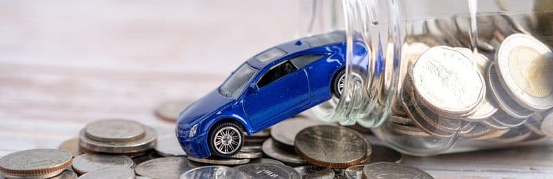 Car falling out of a pot of money