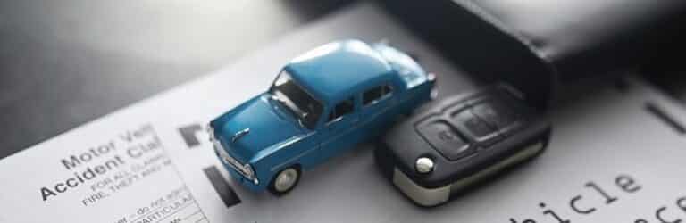 a car on insurance papers