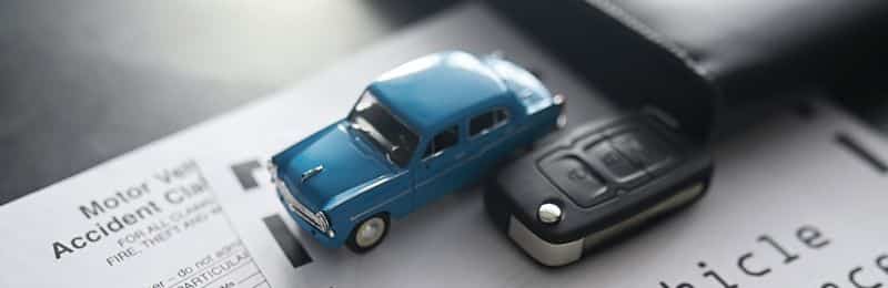 a car on insurance papers